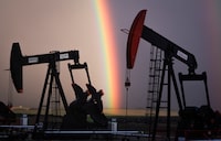 A rainbow appears to come down on pumpjacks drawing out oil and gas from wells near Calgary, Alta., Monday, Sept. 18, 2023. The Alberta Energy Regulator has issued an order requiring Sunshine Oilsands Ltd. to suspend its wells, facilities and pipelines, saying the company hasn't met its regulatory obligations. THE CANADIAN PRESS/Jeff McIntosh