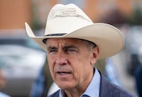 Canadian Prime Minister Mark Carney attends a Stampede pancake breakfast during the Calgary Stampede in Calgary, Alberta, Canada, July 5, 2025.  REUTERS/Todd Korol