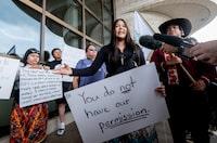 Keisha Paulmartin of Okiniwak Youth Led Movement speaks on Thursday at a protest at the Canadian Museum of History in Gatineau, Que., where Prime Minister Mark Carney met with Indigenous chiefs the same day. 